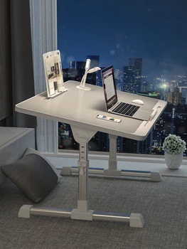 Kis asztal, az ágy, meg lehet szüntetni számítógép asztal hallgató kollégiumi összecsukható asztal egyszerű háztartási egyszerű hálószoba íróasztal